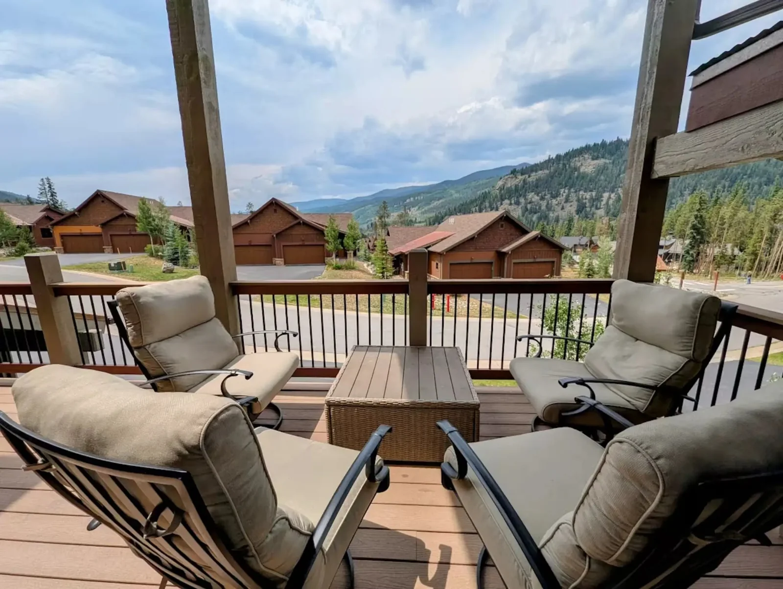 The Alders, Covered deck seating with mountain views, luxury vacation rental in Keystone, Colorado