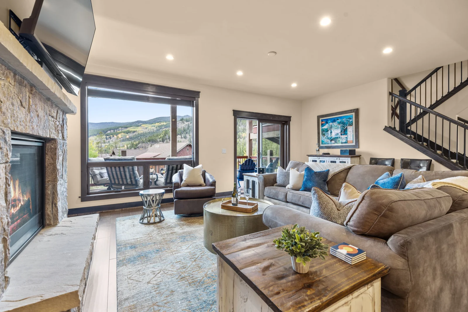 The Alders, Light-filled great room with sofas and mountain views, luxury vacation rental in Keystone, Colorado