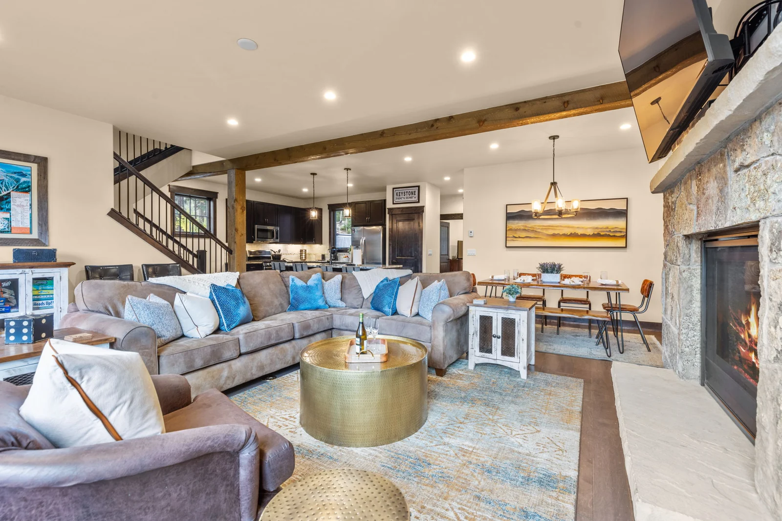 The Alders, Great room facing the kitchen and stone fireplace, luxury vacation rental in Keystone, Colorado