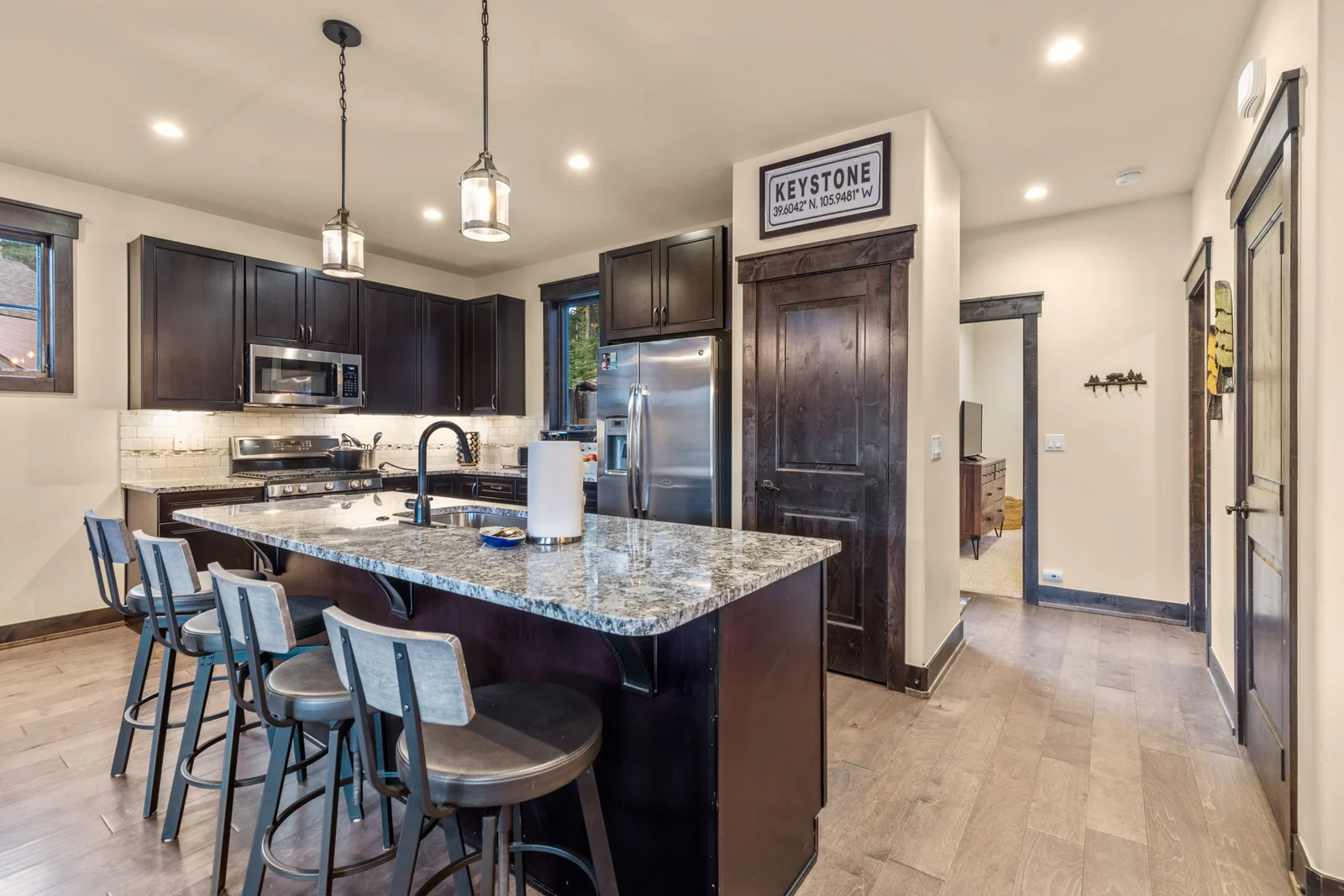 The Alders, Chef kitchen with granite island and bar seating, luxury vacation rental in Keystone, Colorado