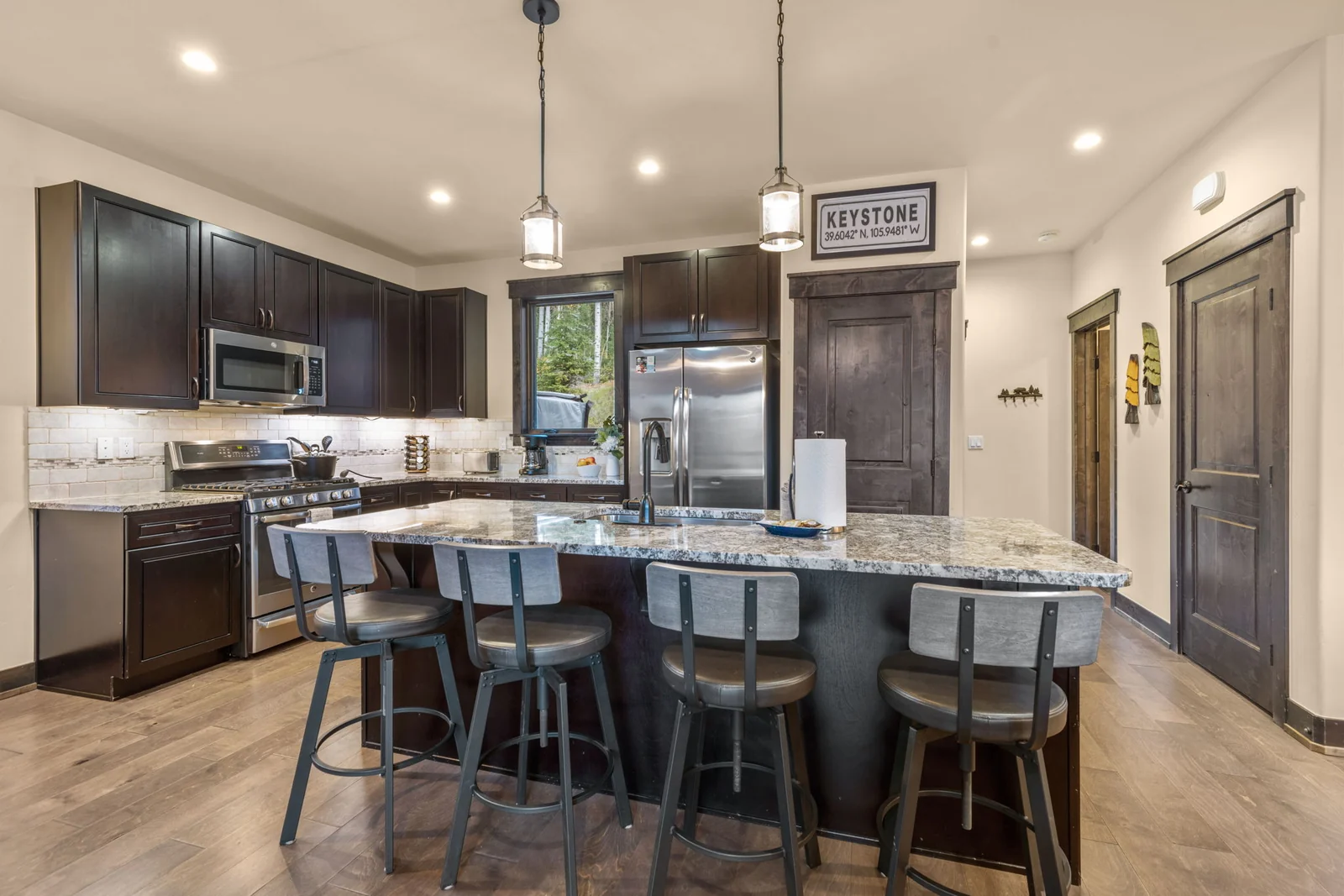The Alders, Granite kitchen island and stainless appliances, luxury vacation rental in Keystone, Colorado