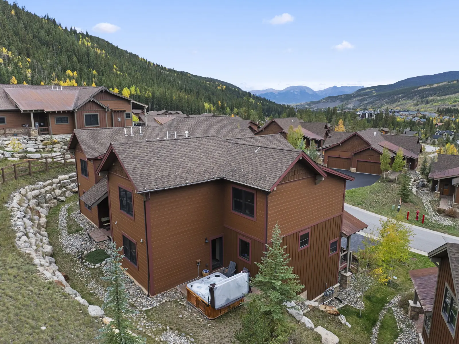 The Alders, Elevated aerial view of the home roofs and surrounding forest, luxury vacation rental in Keystone, Colorado