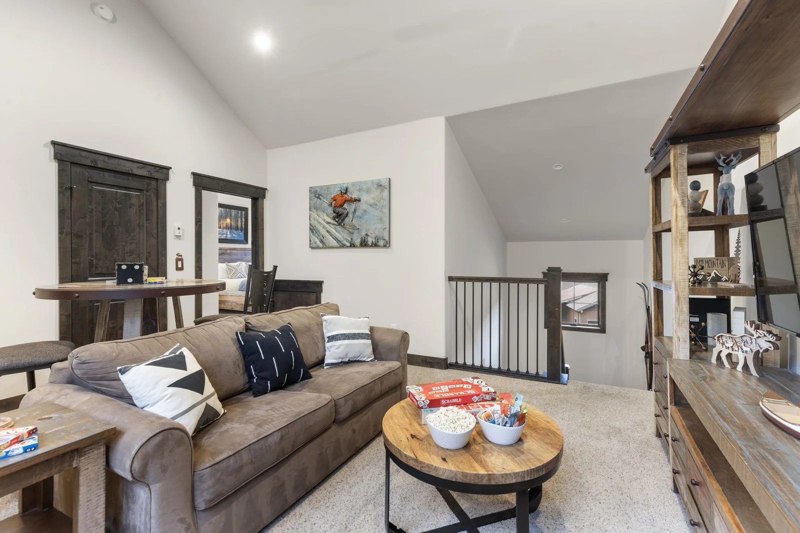 The Alders, Lounge area with sofa and stair landing, luxury vacation rental in Keystone, Colorado