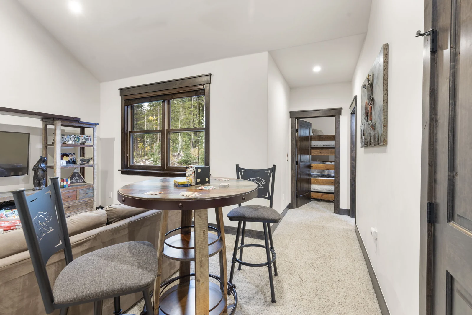 The Alders, Bistro table overlooking the second lounge, luxury vacation rental in Keystone, Colorado