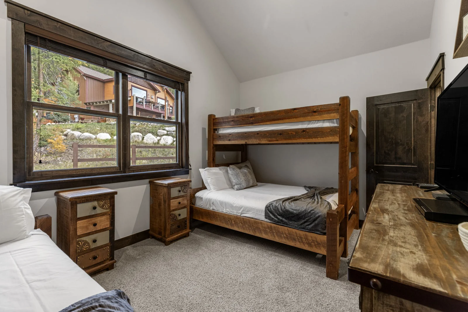 The Alders, Bedroom with bunks and forest-facing window, luxury vacation rental in Keystone, Colorado