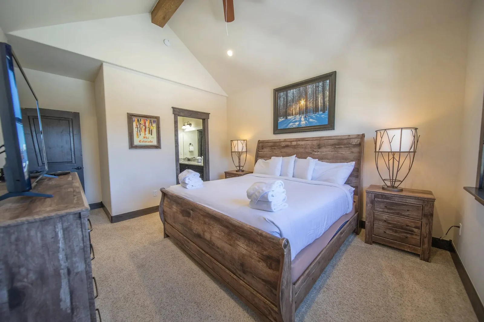 The Alders, Guest bedroom with rustic wood bed, luxury vacation rental in Keystone, Colorado